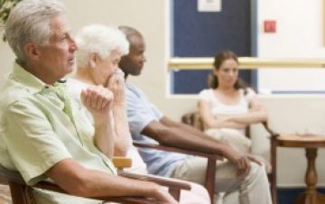 Patients in a waiting room Patients in a waiting room