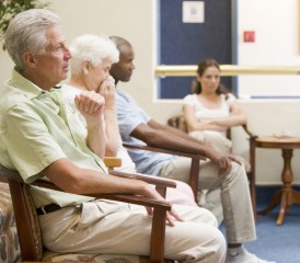 Patients in a waiting room Patients in a waiting room
