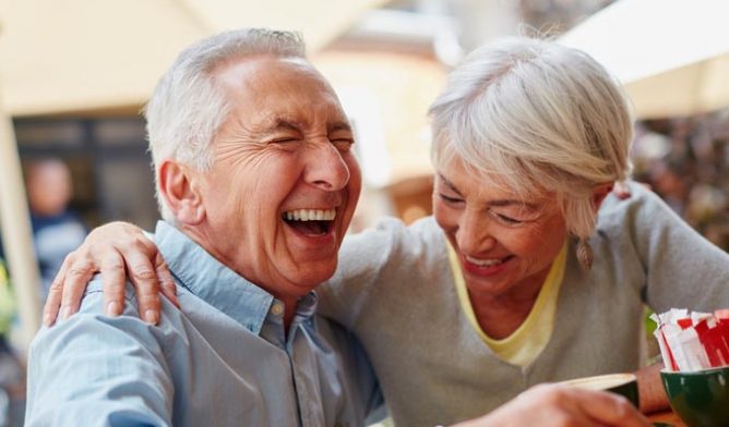 Older couple laughing