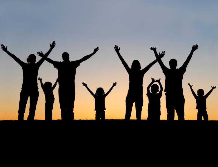 People with arms raised to the sky People with arms raised to the sky