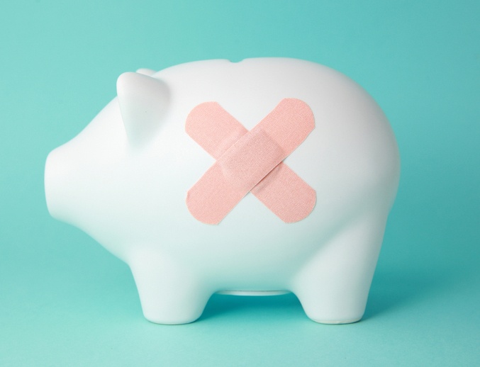 Piggy bank with band aid Piggy bank with band aid