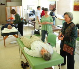Patient Receiving Qigong Therapy Patient Receiving Qigong Therapy