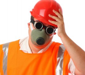 Man wearing safety vest and respirator Man wearing safety vest and respirator