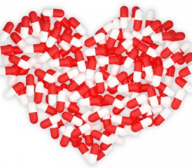 Heart made of red and white pills Heart made of red and white pills
