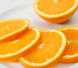 Slices of oranges on a plate Slices of oranges on a plate