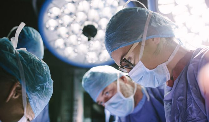 Surgeons in operating room