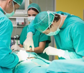 Doctors Performing Surgery Doctors Performing Surgery