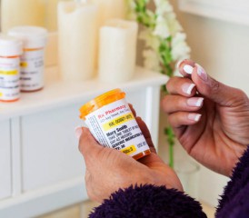 Woman taking medication